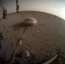 The Insight lander's seismometer seen on the Martian surface.