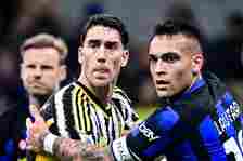 Lautaro Martinez (R) of Inter in action against Dusan Vlahovic (L) of Juventus during the Italian Serie A football match between Inter and Juventus...