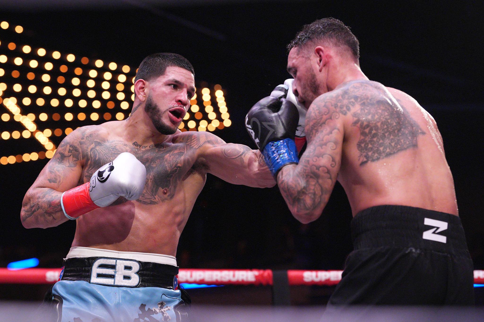 Edgar Berlanga punches Steven Butler during a super middleweight bout.
