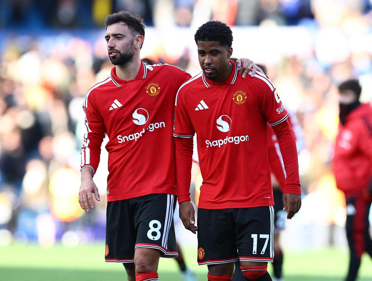 Manchester United's Bruno Fernandes and Andrey Santos at the end of the match against Leeds