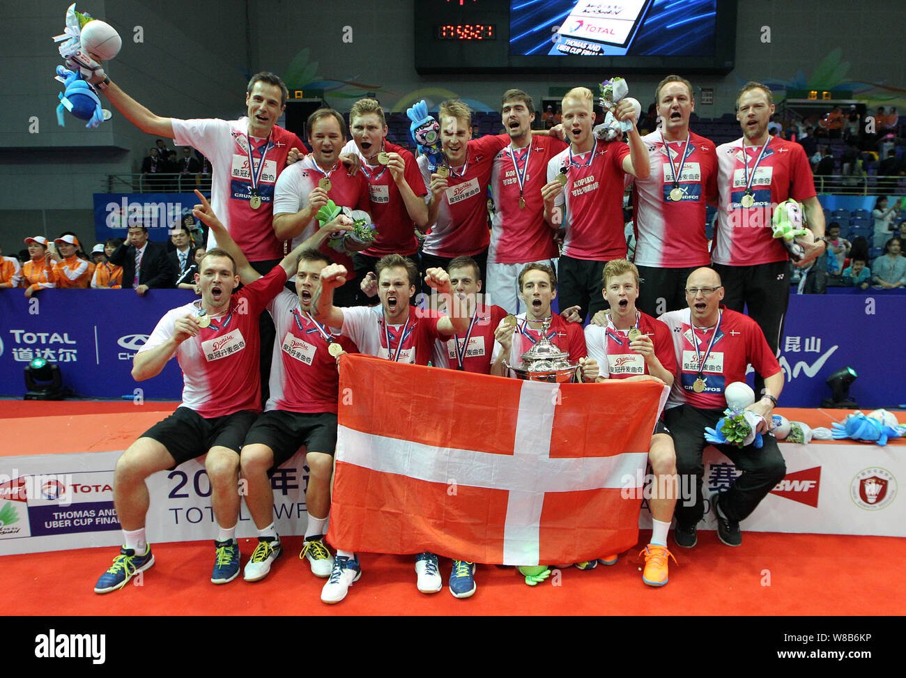 Badminton players of denmark celebrate during the award ceremony after defeating indonesia to win the bwf thomas cup in kunsh