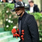 Usher walked the Met Gala red carpet in a dramatic cape, but his $5 million watch stole the show