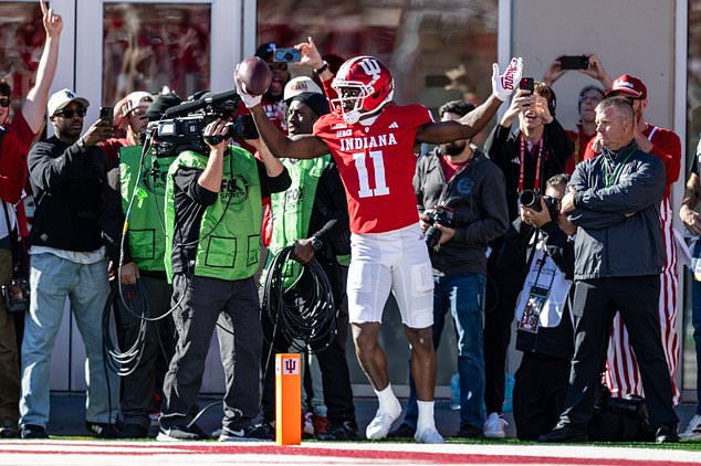 Indiana wide receiver Nick Marsh (11) reacts after realizing he stepped out-of-bounds before completing a catch in the end zone late in the second half of an NCAA college football game against Ohio State, Saturday, Oct. 17, 2026, in Bloomington, Ind. (AP Photo/Doug McSchooler)
