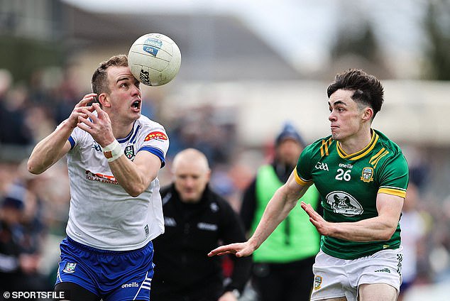 Jack McCarron of Monaghan struggles to control the ball under pressure from Eoin Harkin of Meath - the rule tweaks are designed to improve the flow of football to build on recent progress