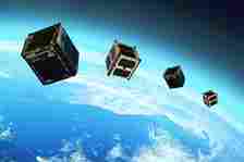 Illustration of CubeSats in space.