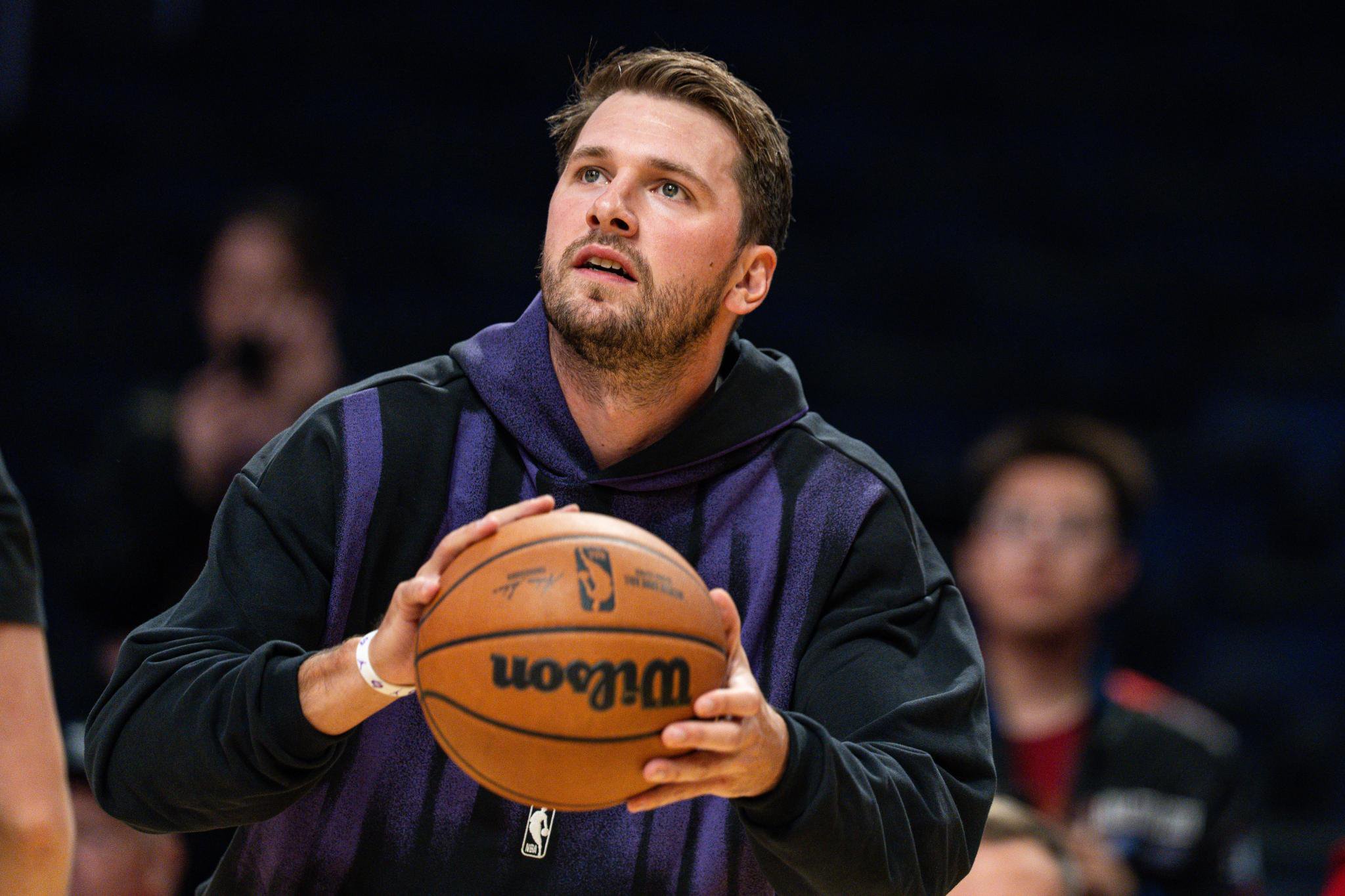 Los Angeles Lakers guard Luka Doncic shoots during pregame warmups.