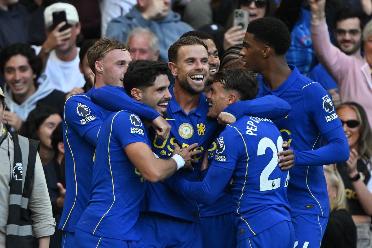 Jordan Henderson of Chelsea celebrates with team mates after scoring his second goal and the team's fifth during the Premier League match against Bournemouth