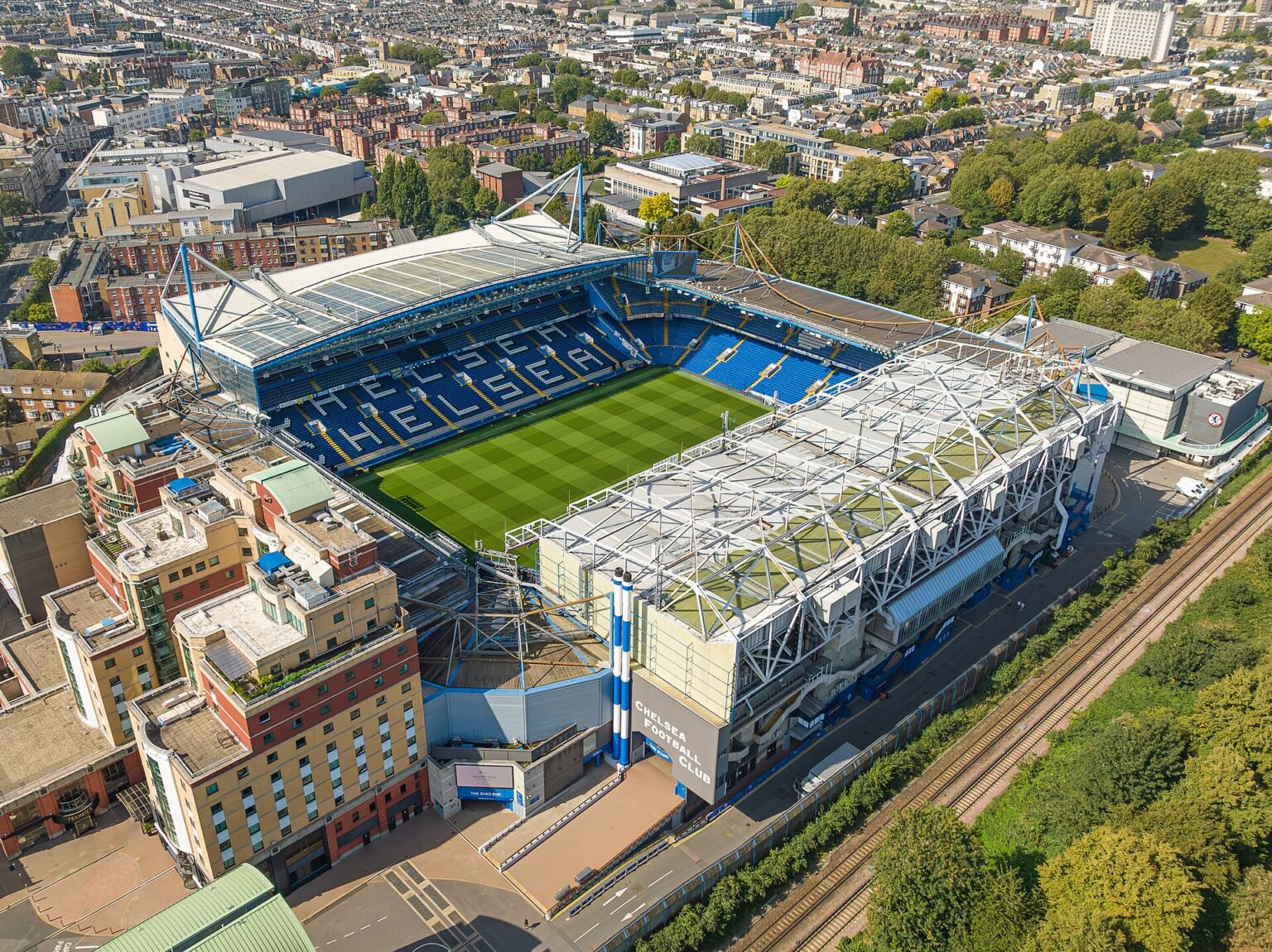 Aerial view of Stamford Bridge stadium with its blue seats and pitch, west London