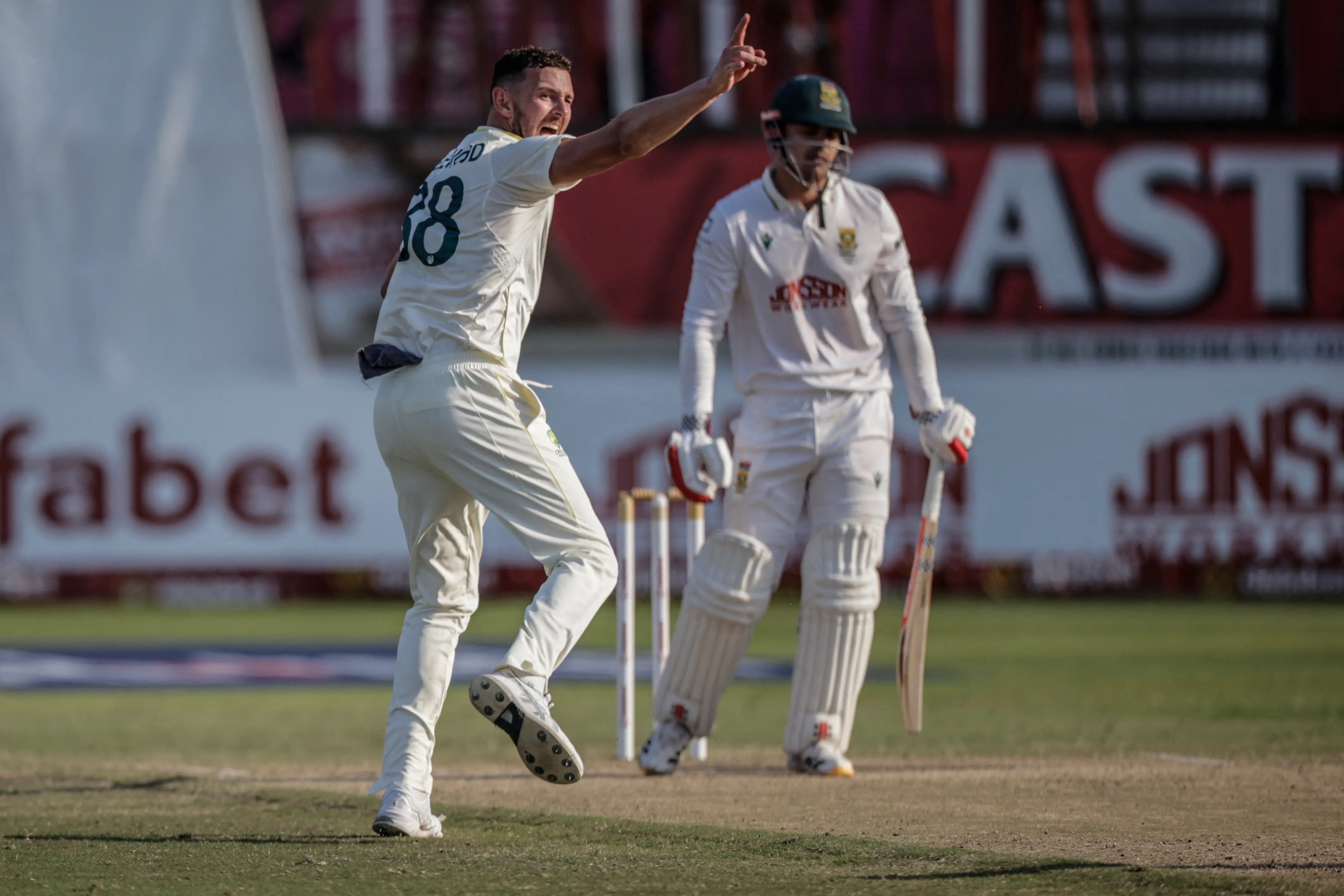 Australia's Josh Hazlewood celebrates the dismissal of South Africa's David Bedingham on day four of the first Test match between South Africa and Australia at the Kingsmead stadium in Durban.