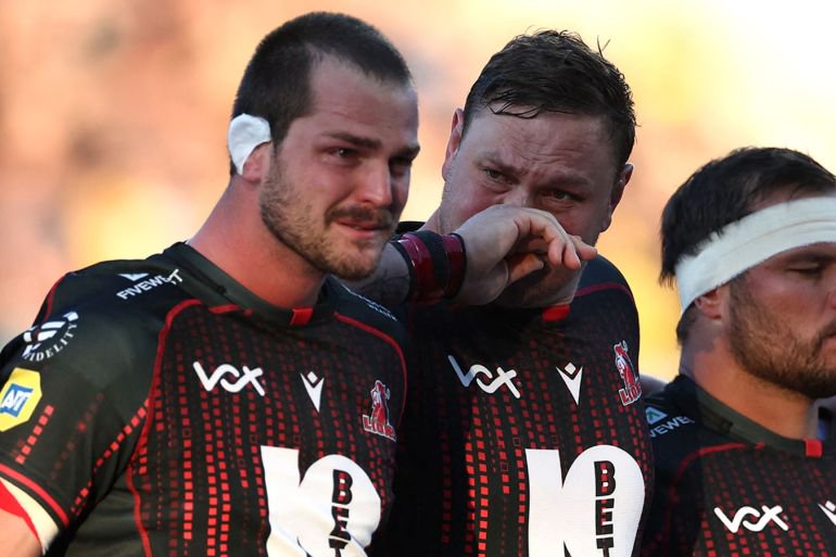 Lions players observe a moment of silence in honour of their teammate Hyron Andrews, ahead of the European Rugby Champions Cup rugby union match between Stade Rochelais (La Rochelle) and Lions at at the Marcel-Deflandre Stadium in La Rochelle, western France, on October 17, 2026. South African second row Hyron Andrews of Johannesburg-based side the Lions was found dead at a hotel in France on October 16, on the eve of his team's Champions Cup match against La Rochelle, local authorities told AFP. (Photo by ROMAIN PERROCHEAU / AFP)