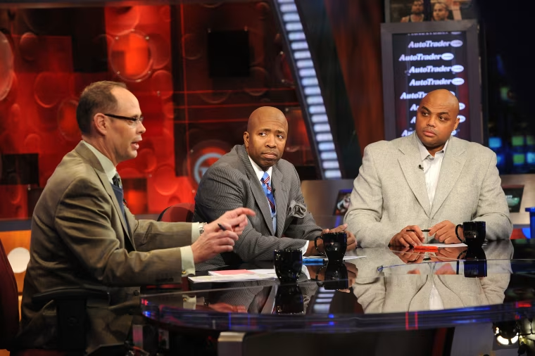 "Inside the NBA" host Ernie Johnson with analysts Kenny Smith, center, and Charles Barkley in 2010.