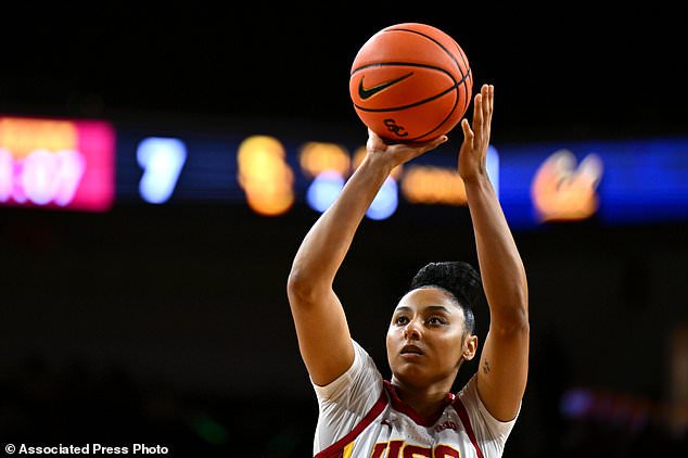 Southern California guard Juju Watkins prepares to shoot/ a free throw during the first half of an NCAA college basketball exhibition game against California, Sunday, Oct. 25, 2026, in Los Angeles. (AP Photo/William Liang)