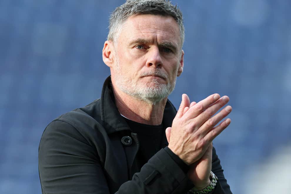 Preston North End manager Graham Alexander applauds the fans at the final whistle