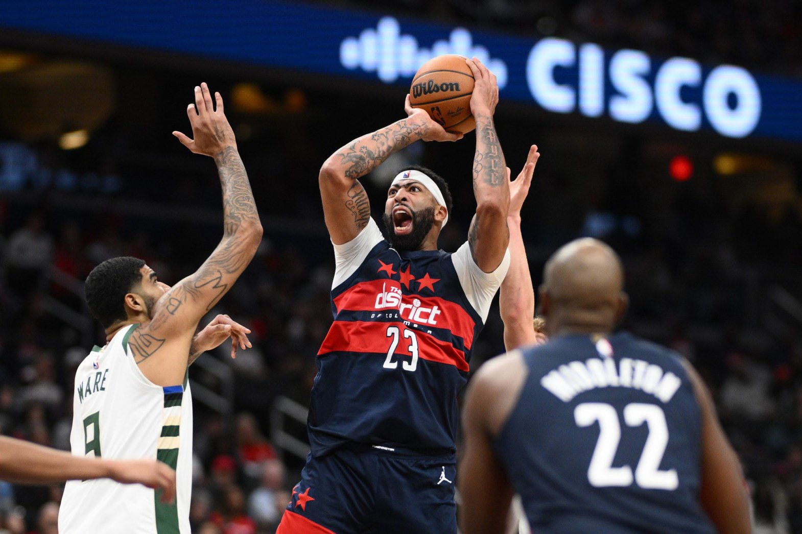 The Wizards' Anthony Davis shoots against the Bucks on Wednesday night in Washington. (AP Photo/Nick Wass)