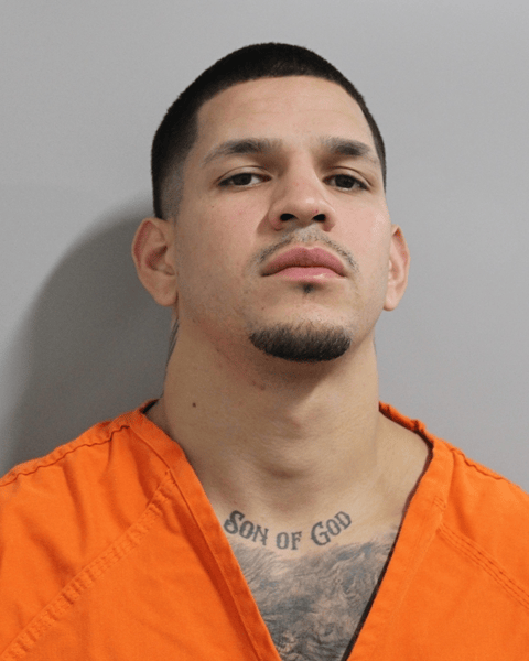 Mugshot of Edgar Berlanga in an orange jumpsuit.