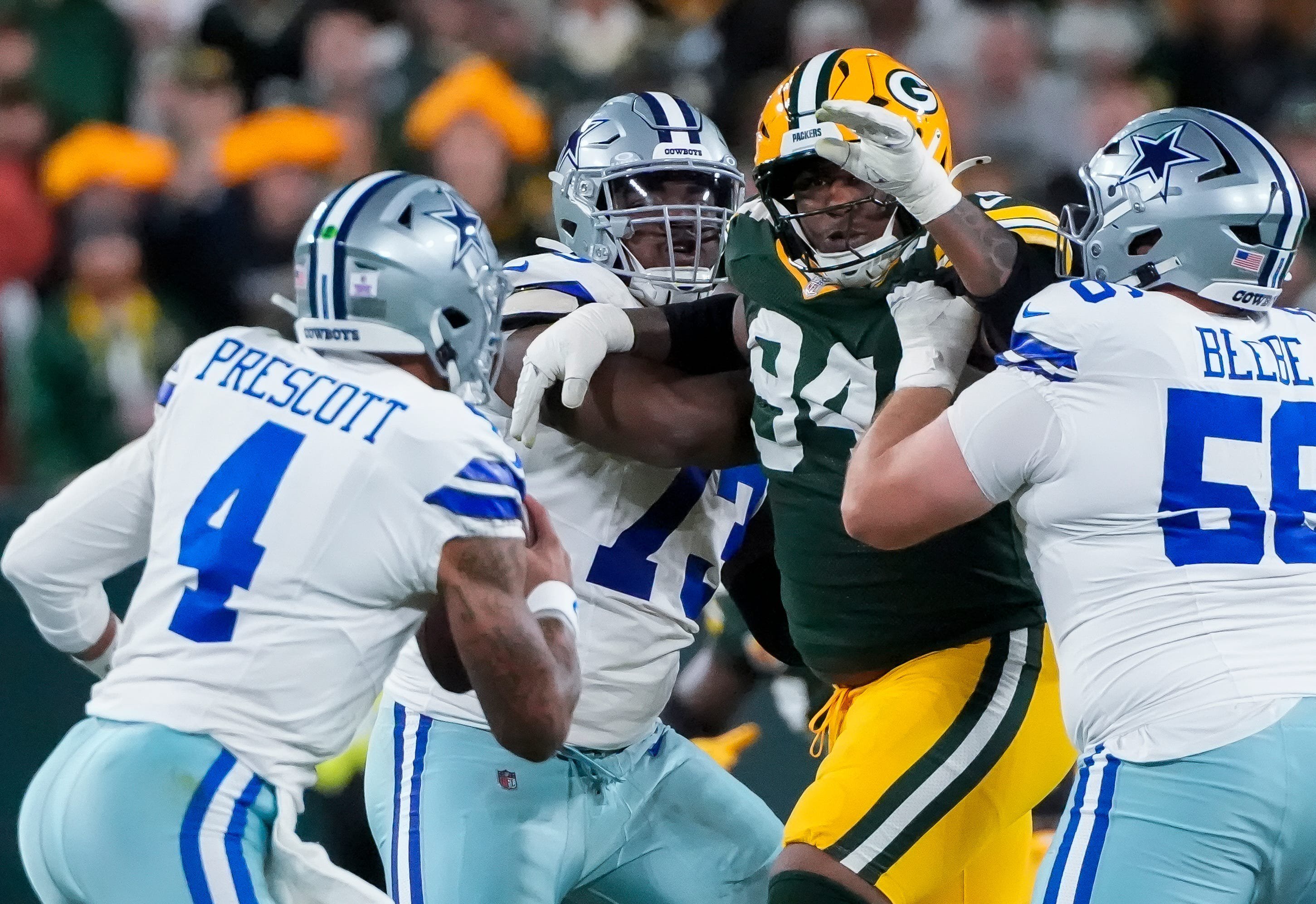 Green Bay Packers defensive tackle Karl Brooks (94) rushes Dallas Cowboys quarterback Dak Prescott (4) on Sunday, Oct. 18, 2026, at Lambeau Field in Green Bay, Wisconsin. The Packers won the game, 23-13.
Tork Mason/Green Bay Press-Gazette