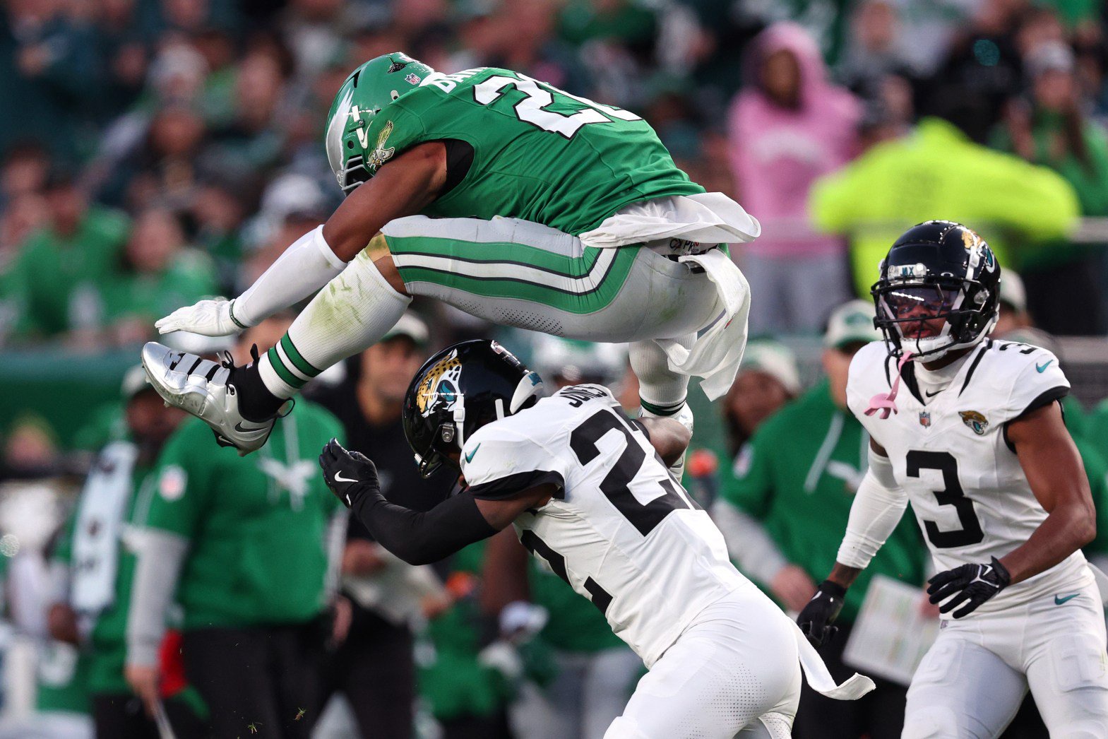 Saquon Barkley #26 of the Philadelphia Eagles hurdles Jarrian Jones #22 of the Jacksonville Jaguars in the second quarter of a game at Lincoln Financial Field on Nov. 03, 2024 in Philadelphia, Pennsylvania. (Photo by Elsa/Getty Images)