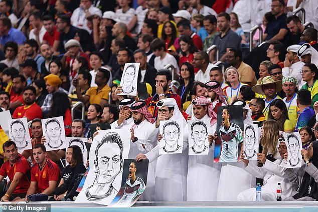 They were held up to challenge Germany after their anti-discrimination gesture on Wednesday