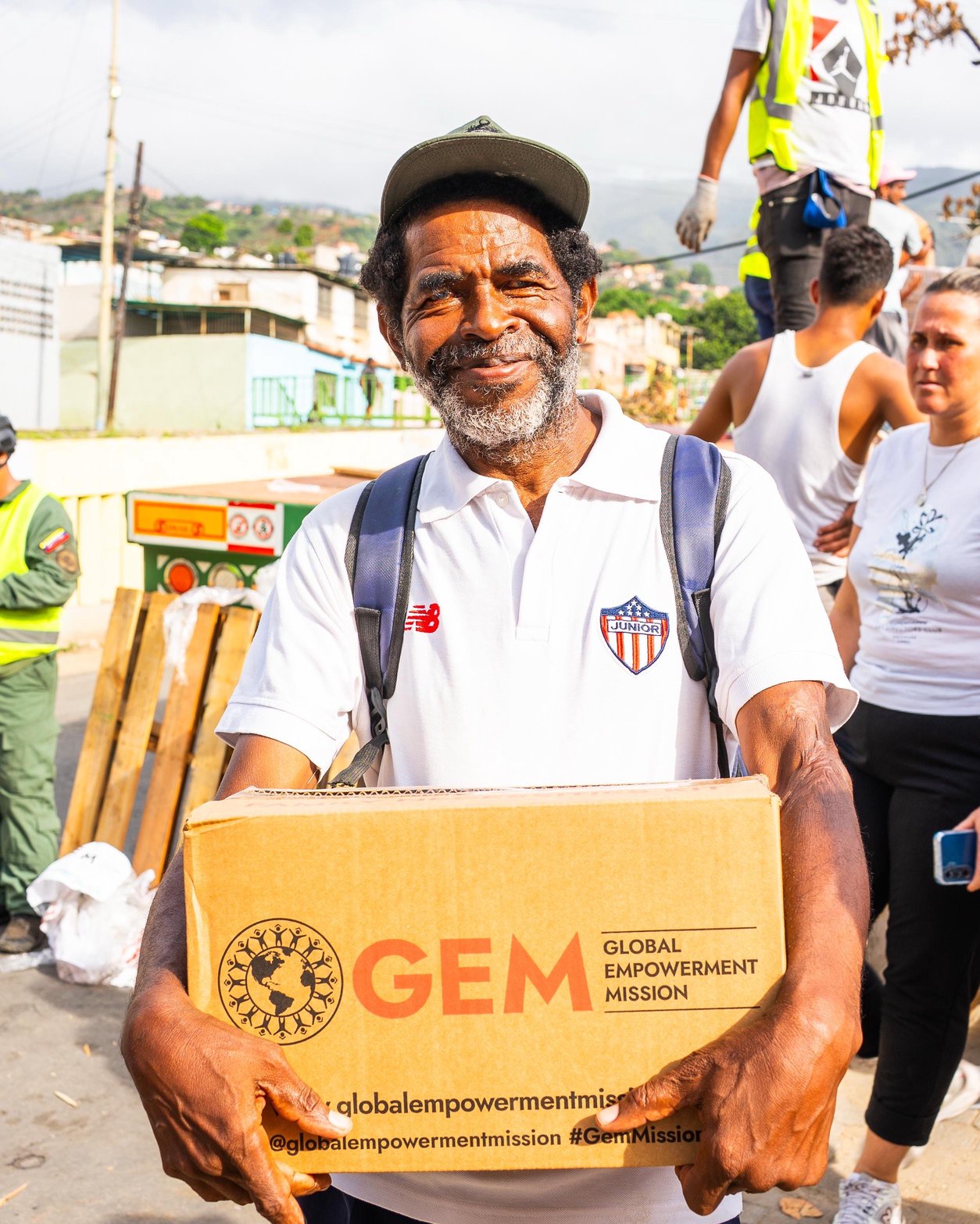 A Venezuelan man receives a donation box collected from relief efforts in Milwaukee and across the U.S. in the wake of two devasting earthquakes to strike the country.