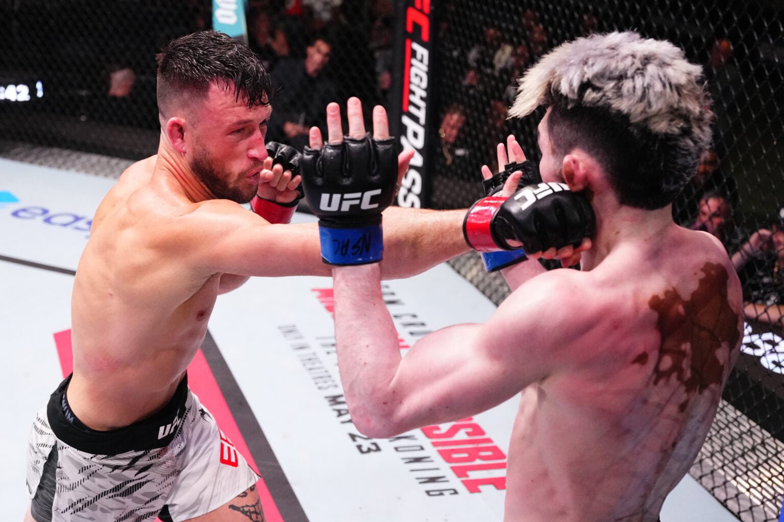 Julian Erosa lands punch on Melquizael Costa during UFC Vegas 106 fight