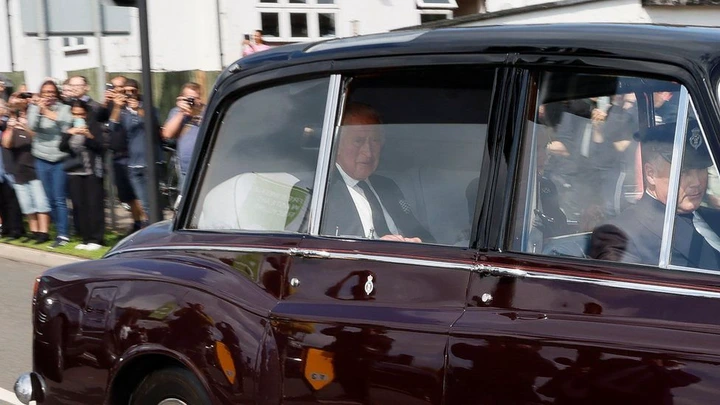 King Charles in the royal limousine