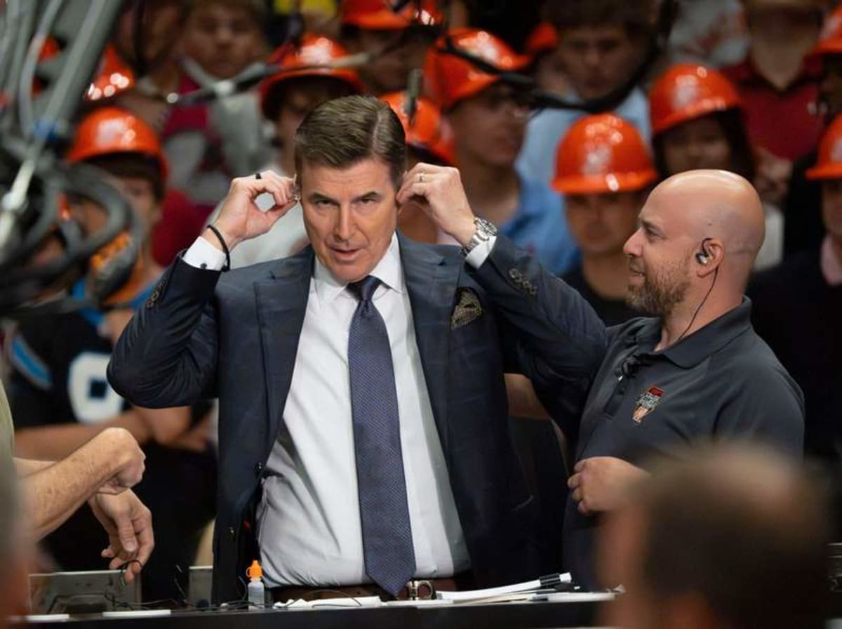 Oct. 10, 2026; Tuscaloosa, AL, USA; ESPN’s College GameDay show airs from inside Coleman Coliseum to avoid the weather caused by Hurricane Isaias. Co-host Rece Davis gets his equipment on as he prepares for the show.