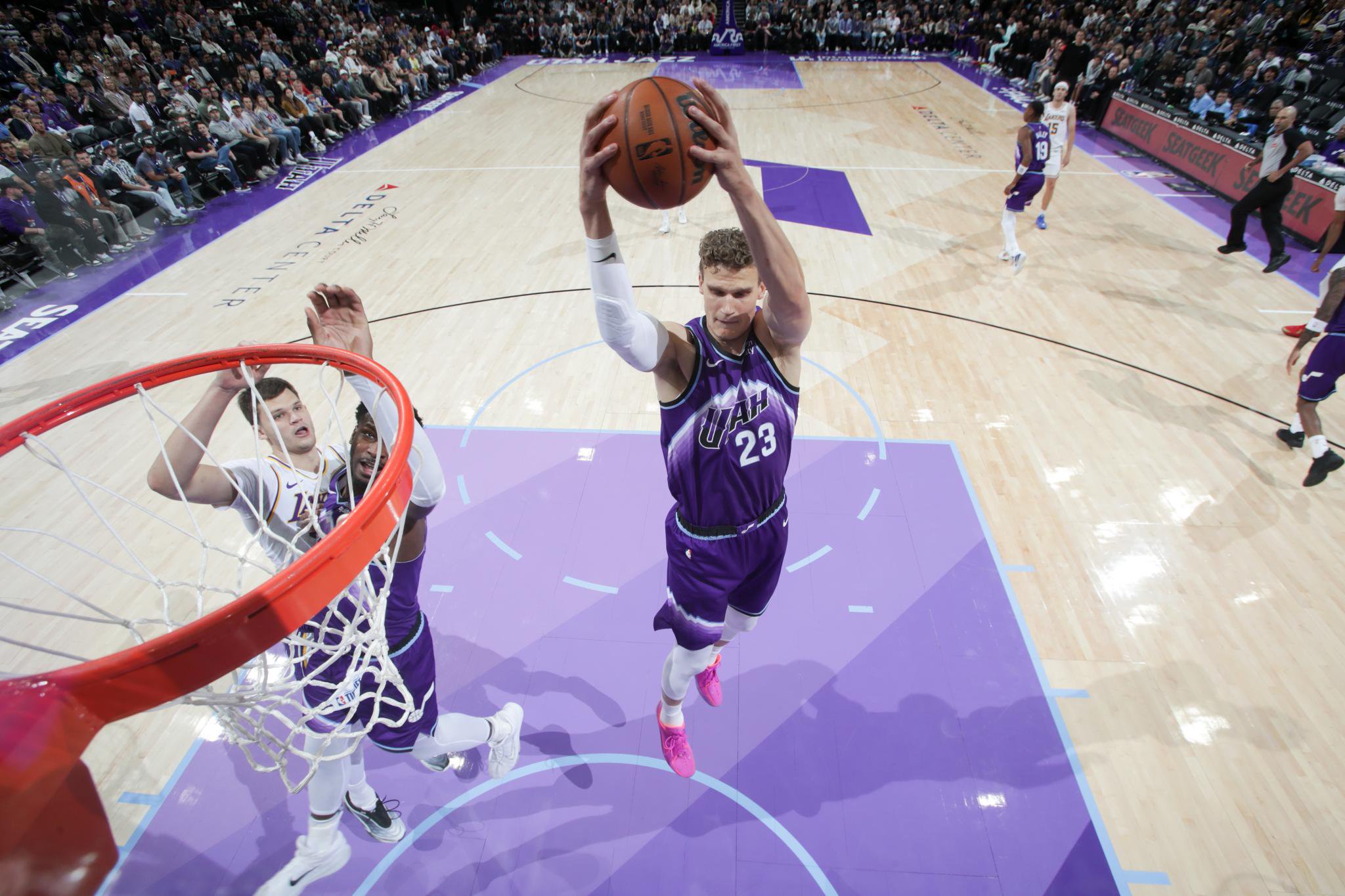 Utah Jazz's Lauri Markkanen (23) grabs a rebound against the Los Angeles Lakers during an NBA basketball game at Delta Center in Salt Lake City, Sunday, Oct. 25, 2026.