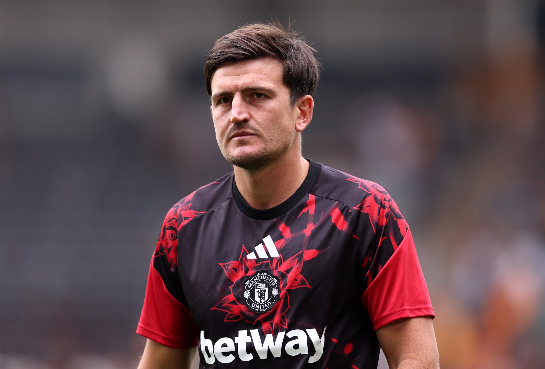 Harry Maguire of Manchester United warms up before the Premier League 2026/27 match between Hull City and Manchester United at MKM Stadium on August 22, 2026 in Hull, England