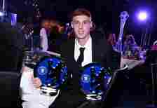 Cole Palmer of Chelsea with his two awards for Chelsea Players Player of the Year, and Chelsea Player of the Year, during the Chelsea FC 2024 Award...