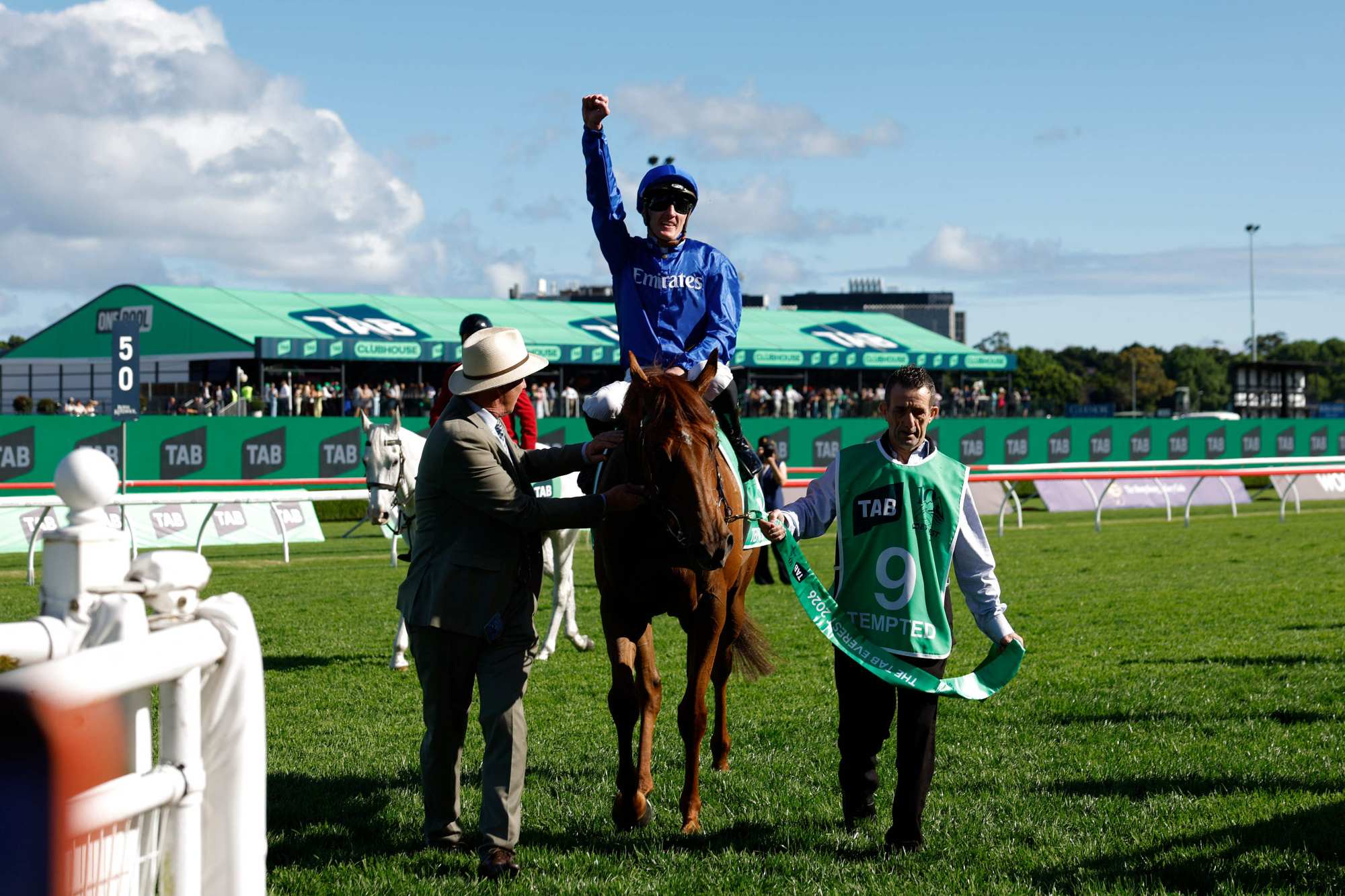 Jockey Chad Schofield celebrates his win on Tempted in The Everest.