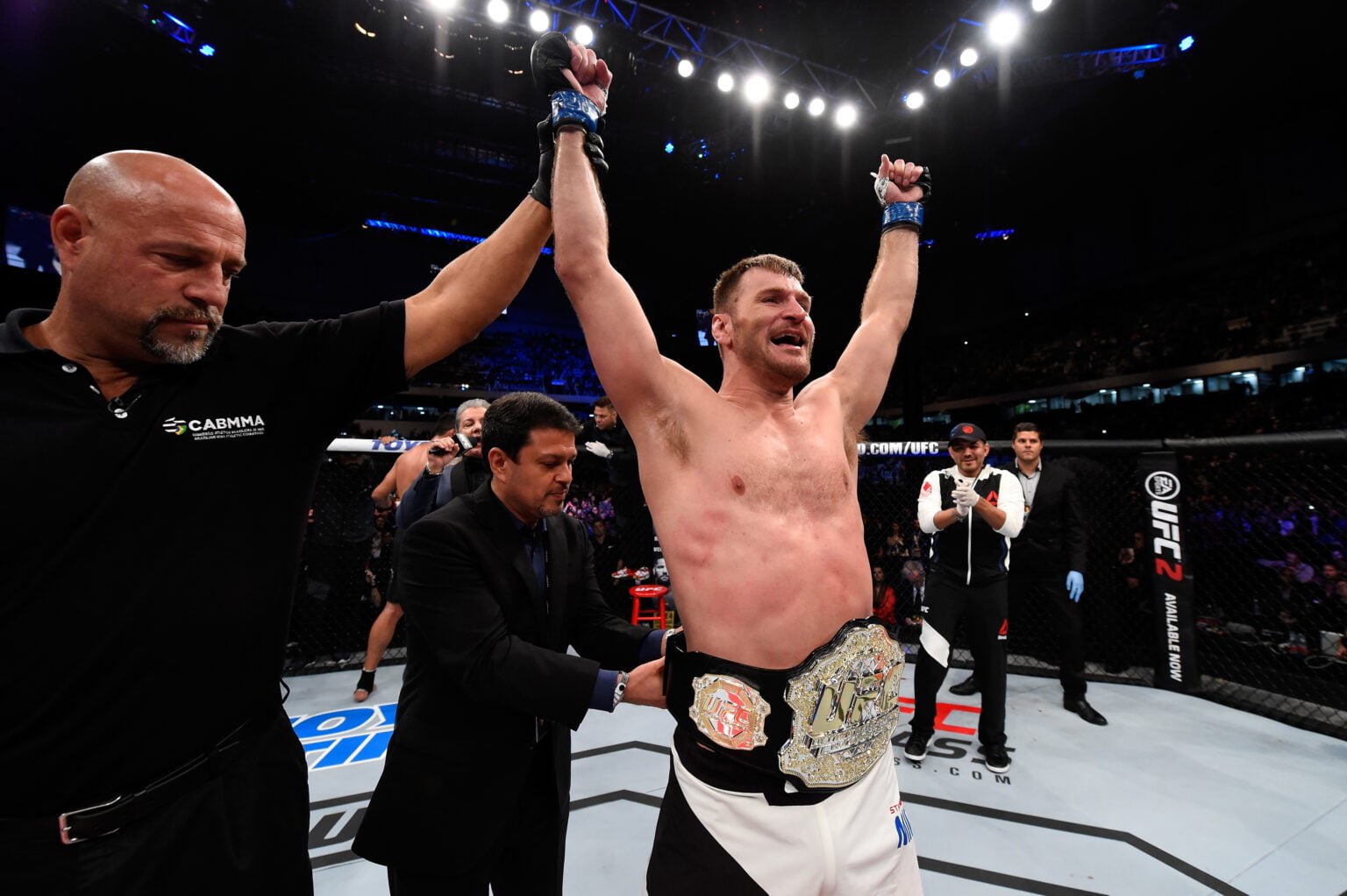 Stipe Miocic celebrates after beating Fabricio Werdum at UFC 198