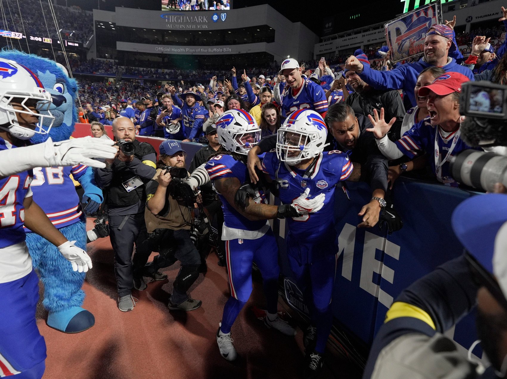 Fans celebrate with Buffalo Bills linebacker Terrel Bernard after he recovered the fumble Ravens made during a punt return at Highmark Stadium in Orchard Park on Sept. 7, 2025.