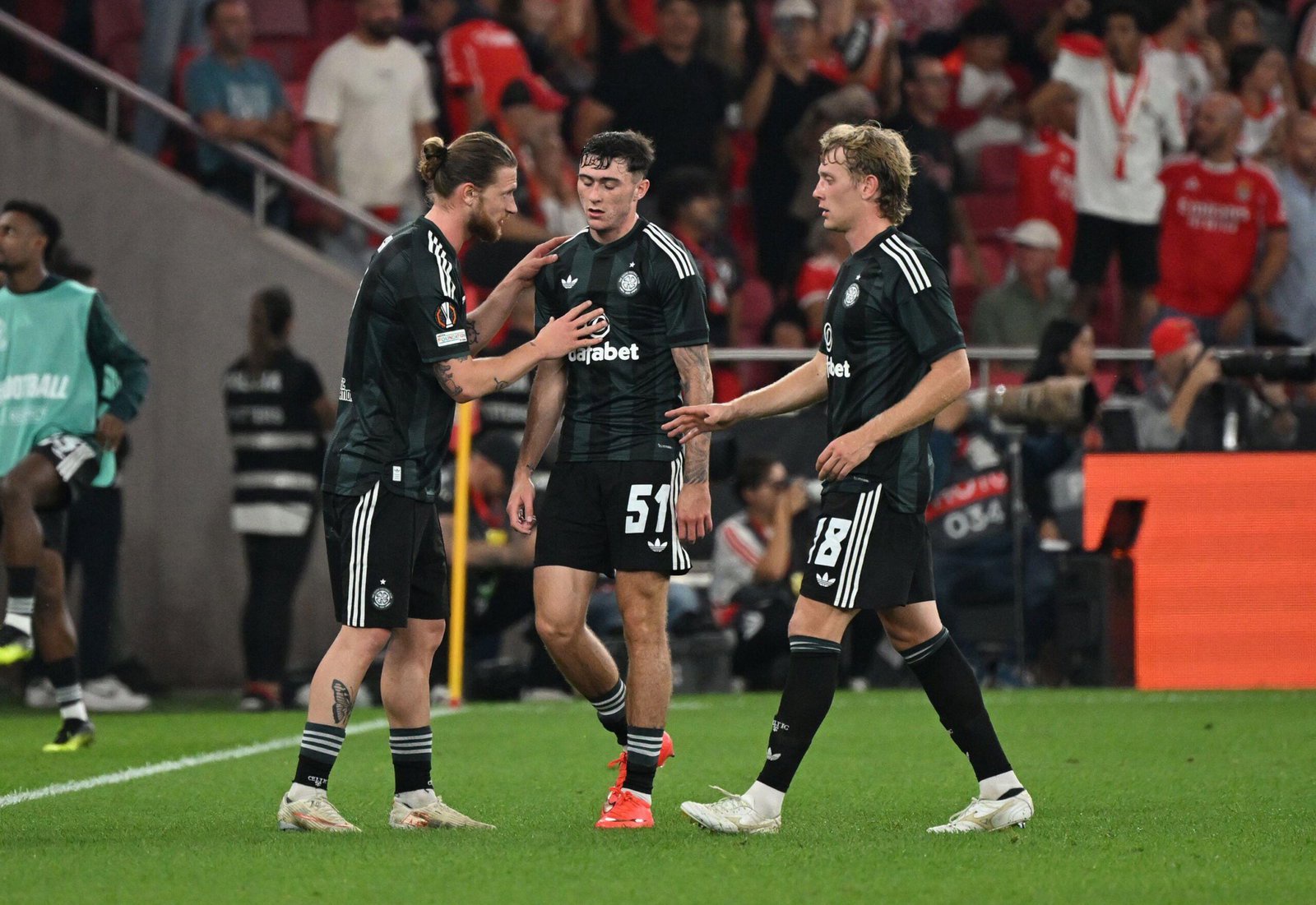 Dejected Celtic players after conceding a second goal to Benfica at the Estadio da Luz in Lisbon