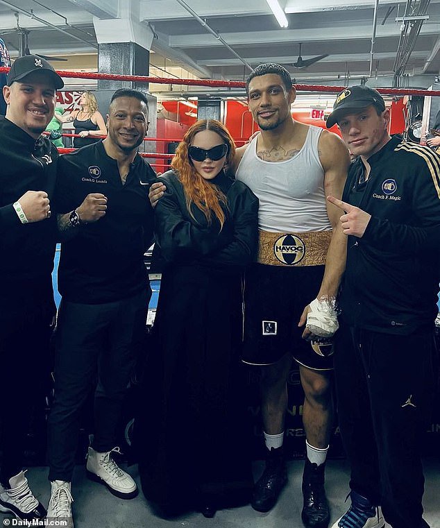 The singer was seen cuddling up to her sparring partner alongside friends in a series of snaps shared on Instagram last month