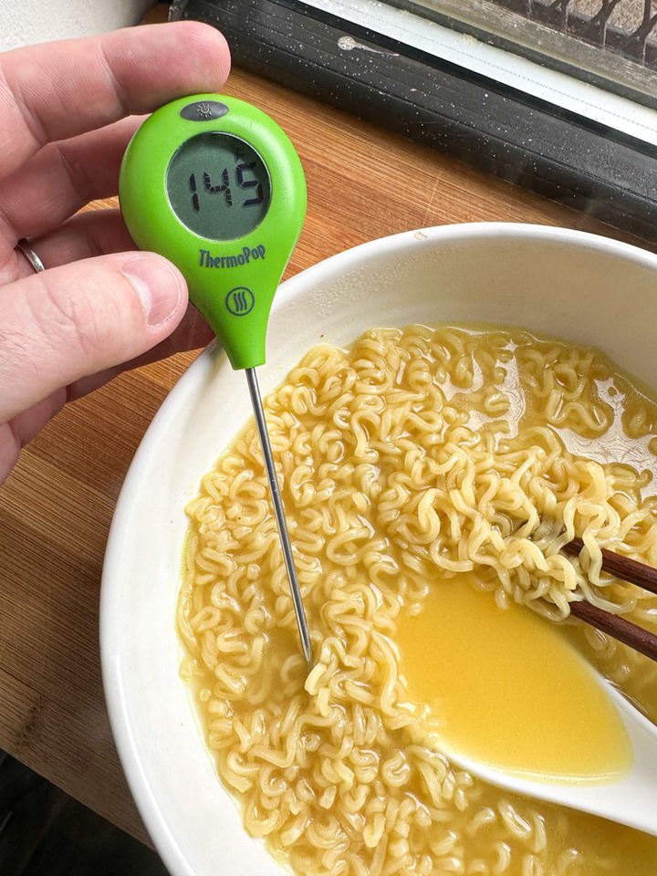 thermometer registers 145 degrees in bowl of hot ramen