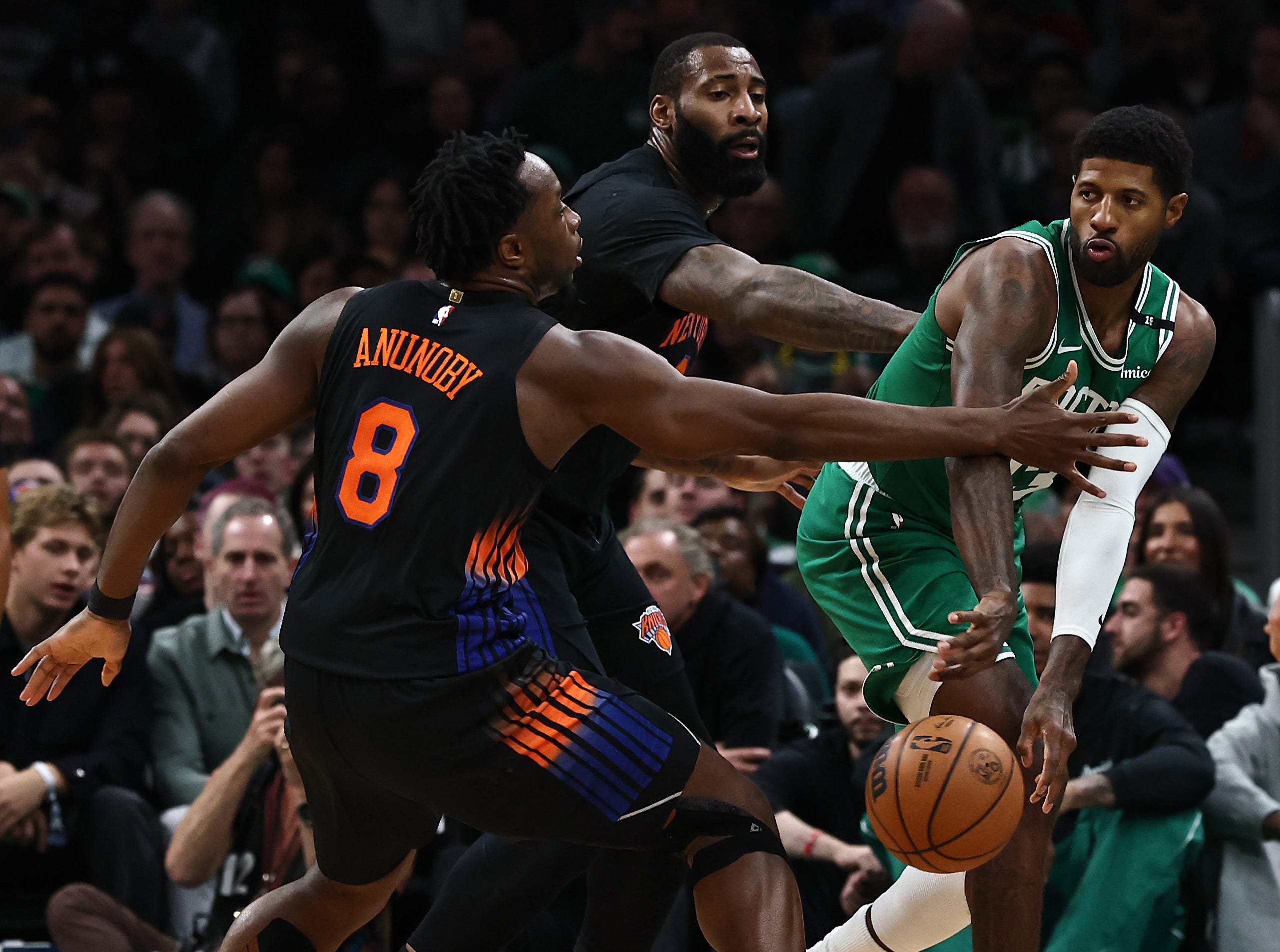 Oct 23, 2026; Boston, Massachusetts, USA; Boston Celtics forward Paul George (13) passes around New York Knicks forward Og Anunoby (8) during the second quarter at TD Garden. Mandatory Credit: Winslow Townson-Imagn Images