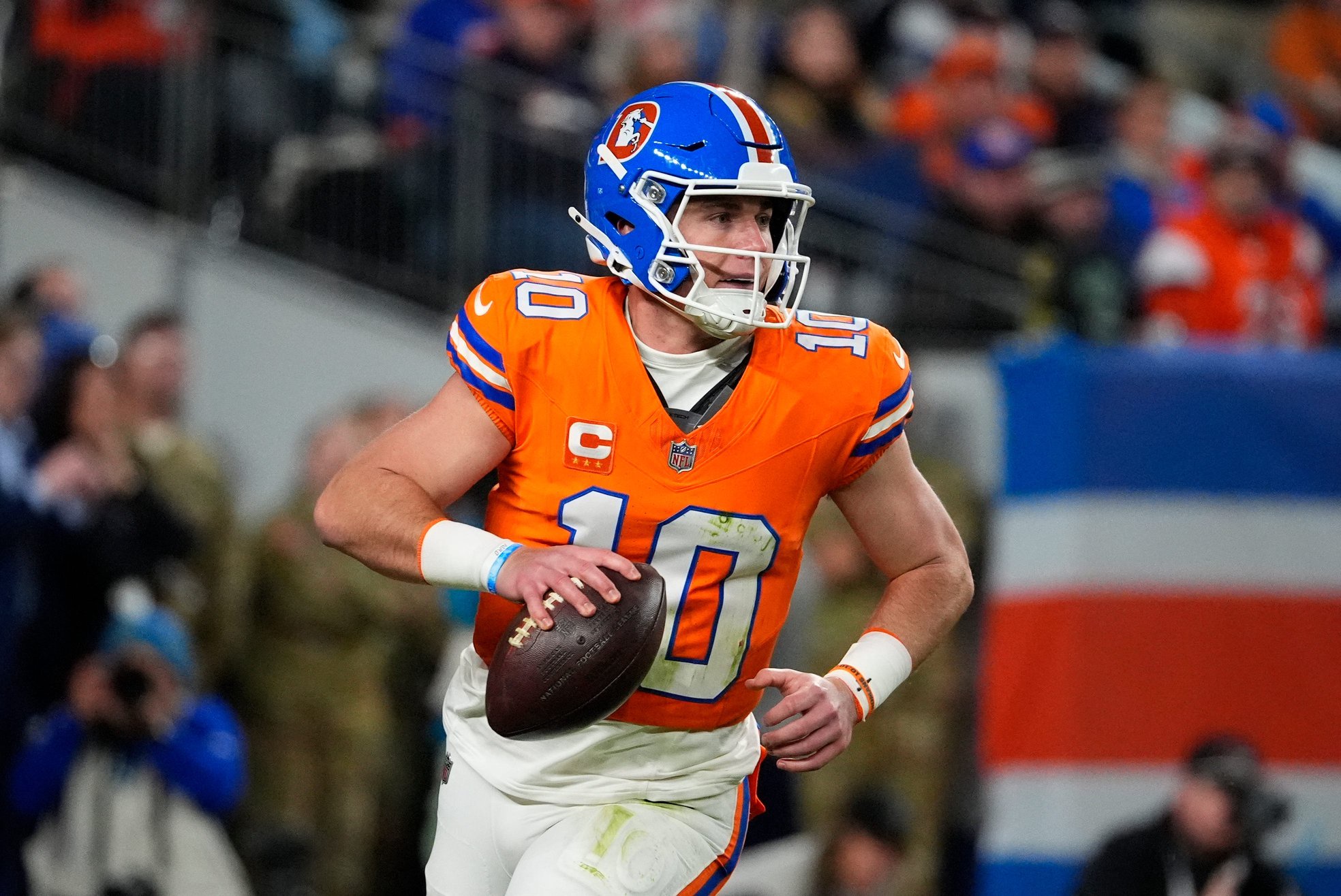 Oct 15, 2026; Denver, Colorado, USA;  Denver Broncos quarterback Bo Nix (10) looks to throw in the second half against the Seattle Seahawks at Empower Field at Mile High.  Mandatory Credit: Ron Chenoy-Imagn Images