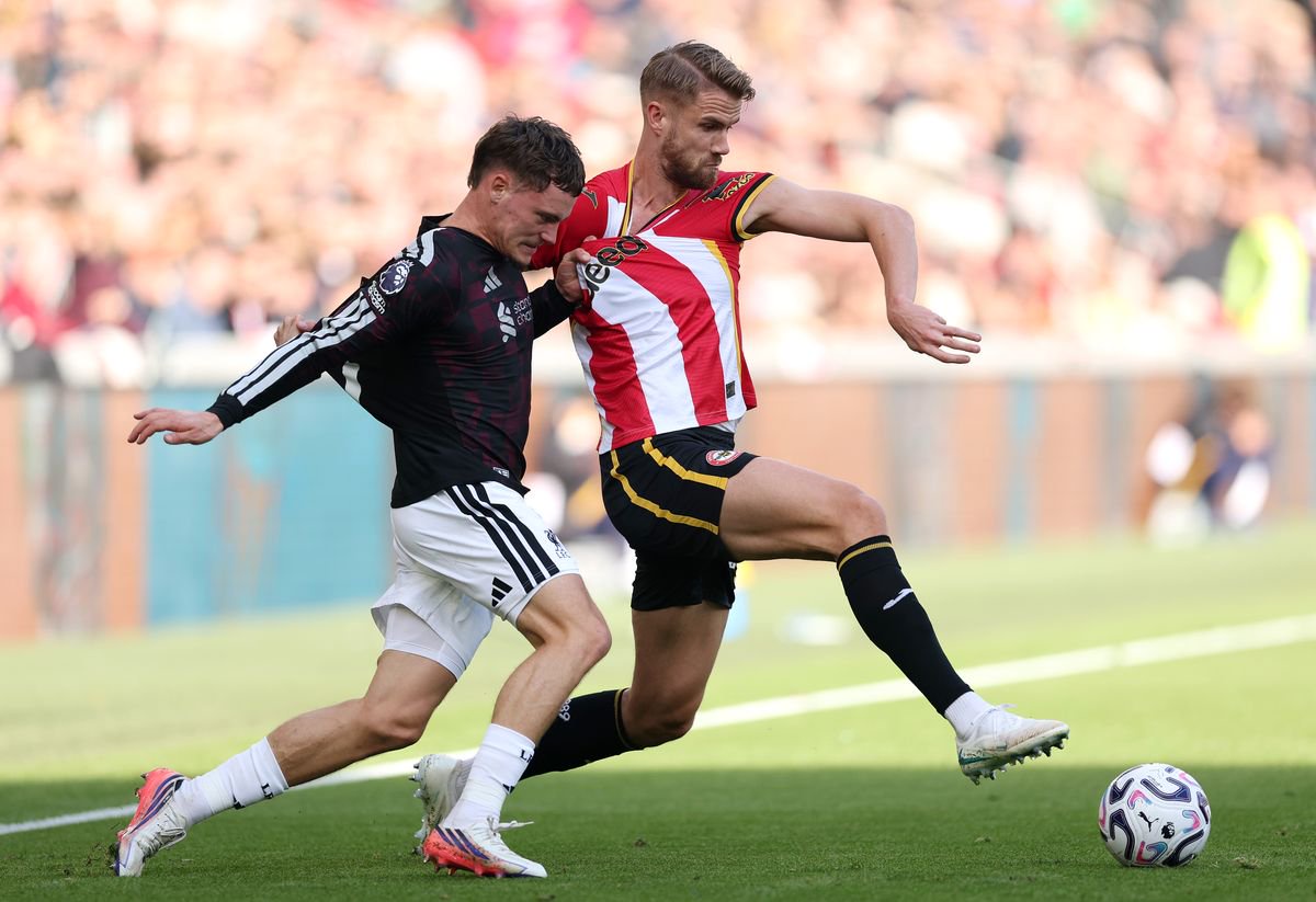 Florian Wirtz battles Kristoffer Ajer during Brentford 1-2 Liverpool.