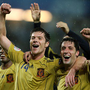 Xabi Alonso - Spain's Xabi Alonso (left) and Joan Capdevila celebrate after the final whistle.  (Photo by Mike Egerton - PA Images via Getty Images)
