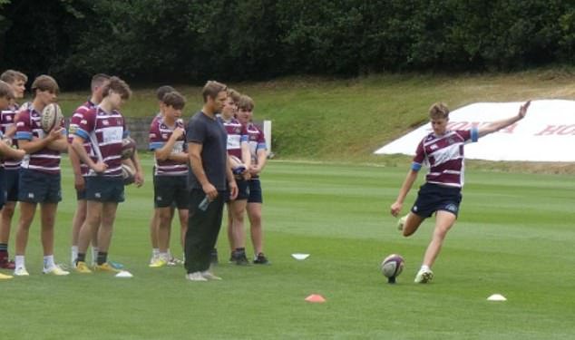 A 15-year-old Pater does some kicking under the watchful eye of Jonny Wilkinson (Source: Instagram/Jamespater_)