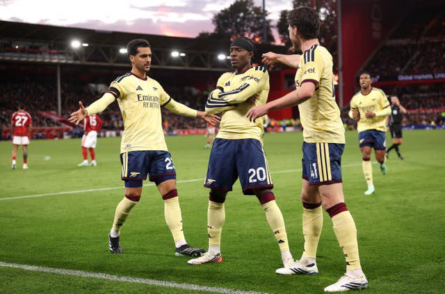 Noni Madueke celebrates after breaking the deadlock for Arsenal