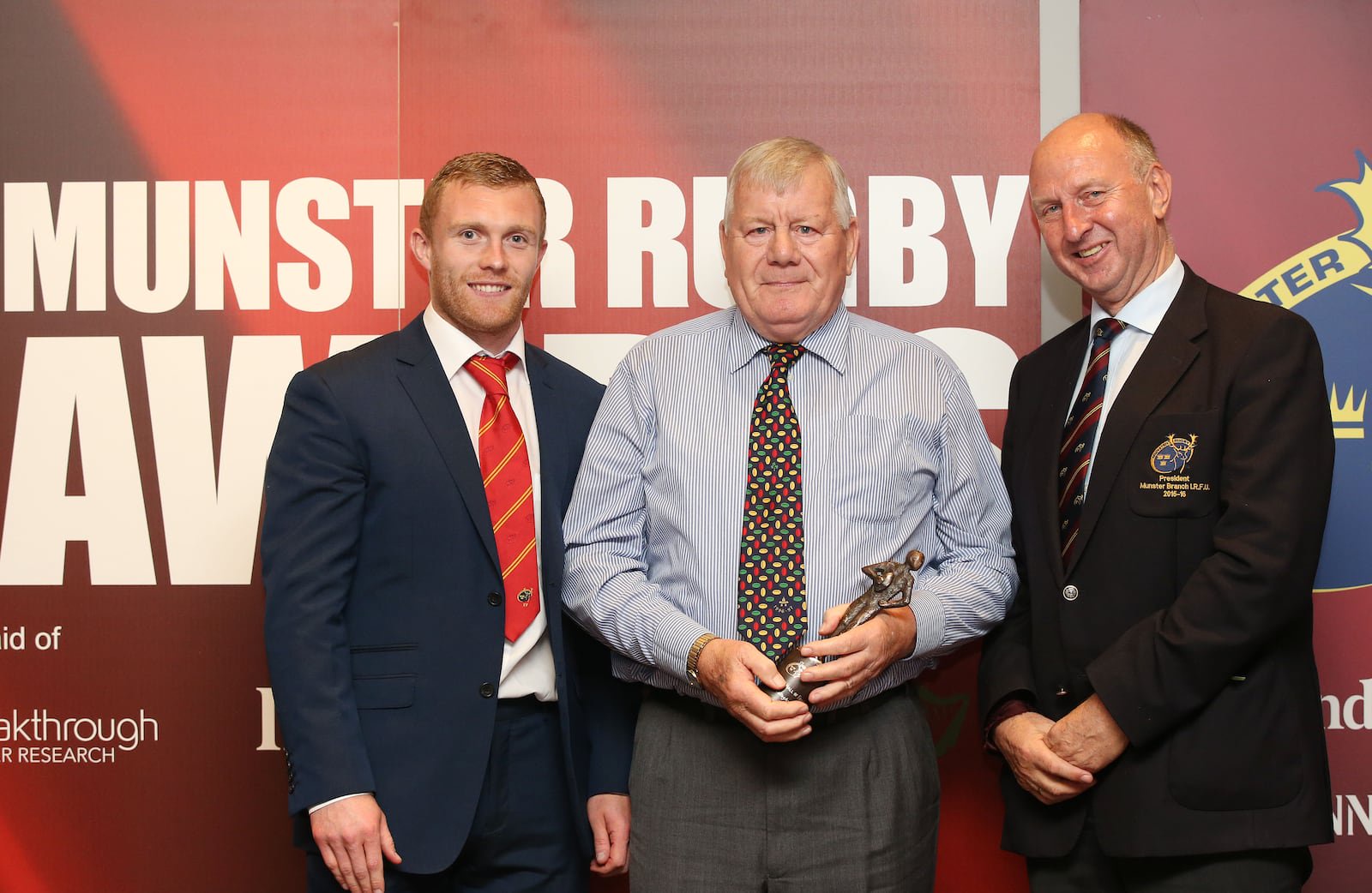 Phil O'Callaghan on receiving a Hall of Fame Award from Munster Rugby in 2015 pictured with Keith Earls and Munster Branch president Bertie Smith. Photograph: Cathal Noonan/Inpho