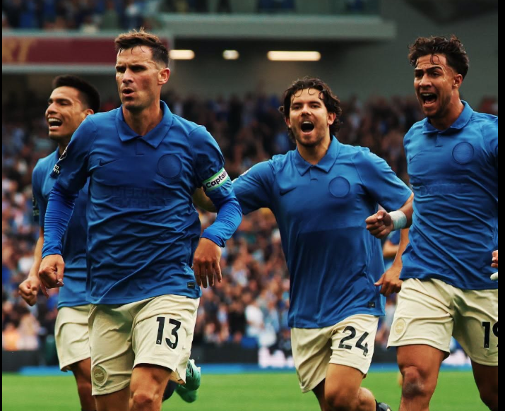 Pascal Gross lead Brighton players in celebration after his goal against Arsenal. PHOTO/https://web.facebook.com/officialbhafc