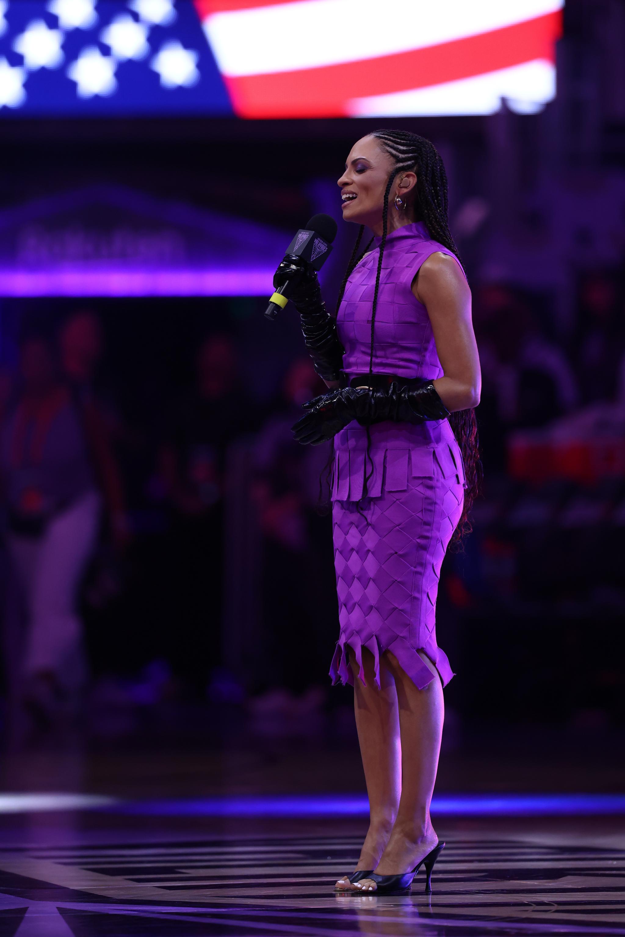 Goapele performs the national anthem before game one of the WNBA Finals between the Golden State Valkyries and Atlanta Dream.