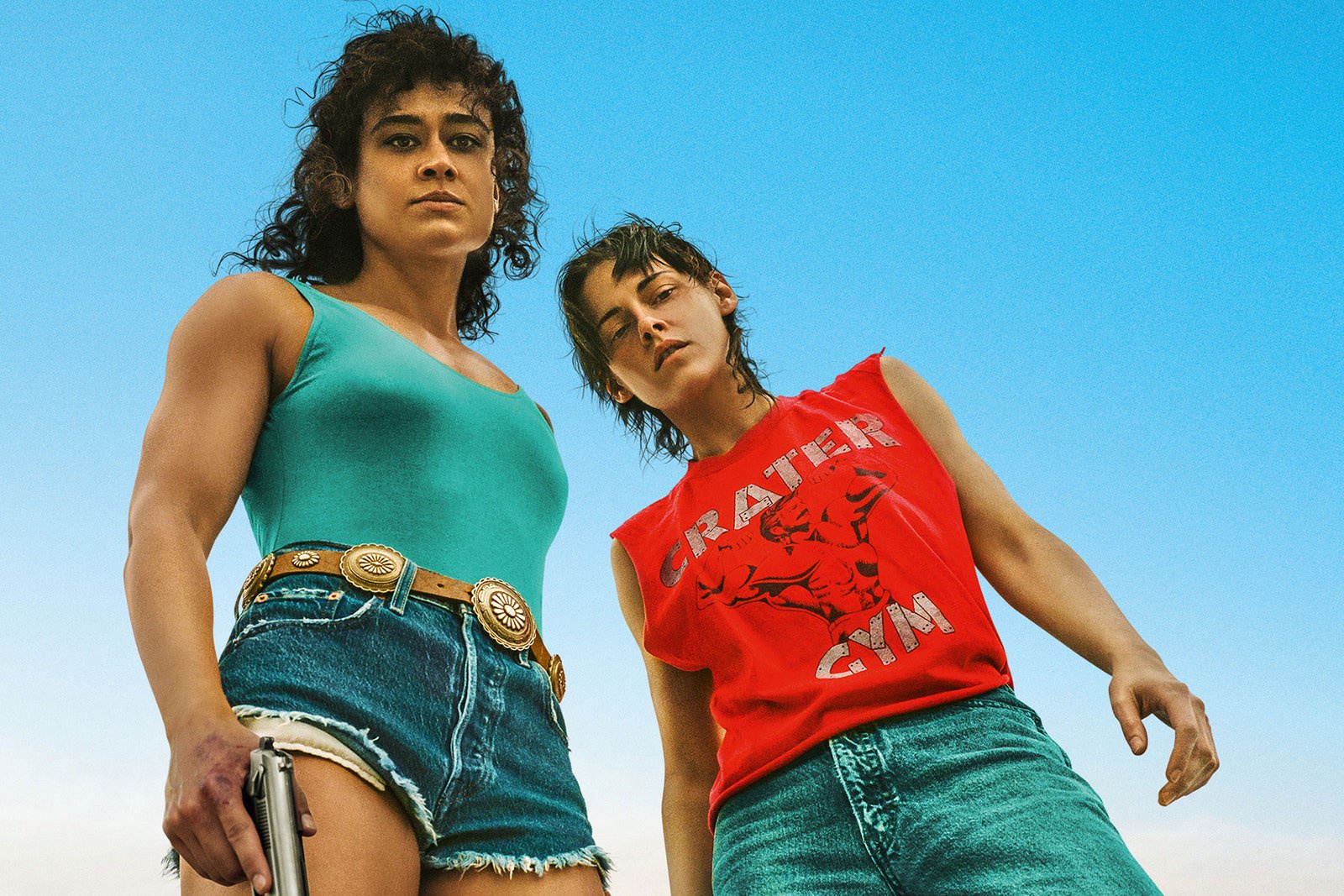 Image may contain Kristen Stewart Clothing TShirt Adult Person Teen Accessories Belt Pants Gun and Weapon