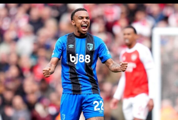 Eli Junior Kroupi celebrates after scoring against Arsenal