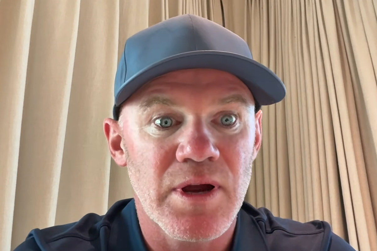 Wayne Rooney speaking into a camera