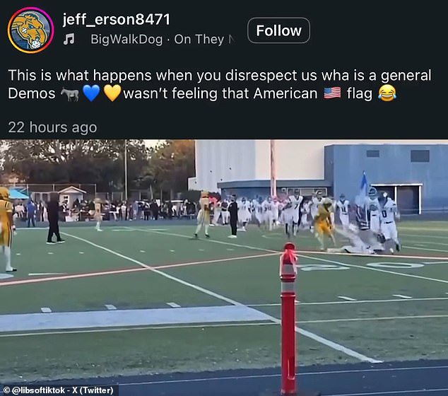As the flag-bearer crossed the field, a Jefferson player sprinted over and barged into him