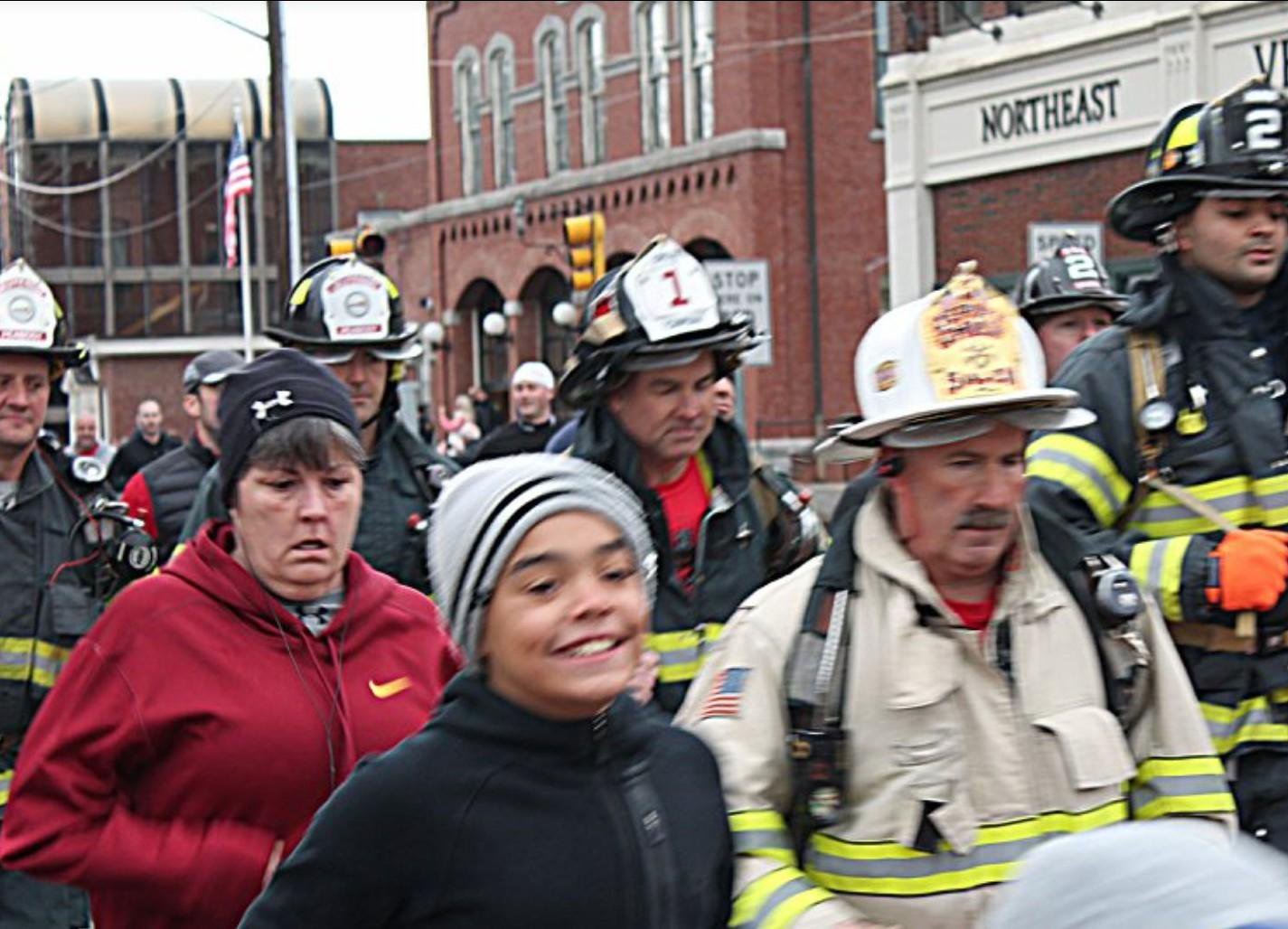 Retired Massachusetts fire chief Dennis LeVasseur participating in a run with firefighters.
