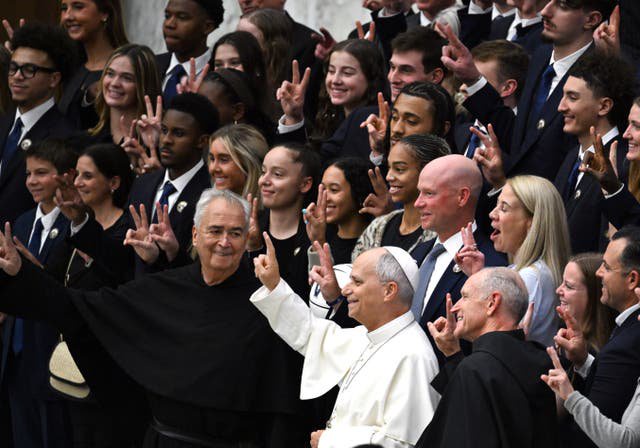 Pope Leo XIV poses with a delegation from the Villanova Wildcats basketball team during an audience with delegations from Villanova University and the University of Notre Dame at the Paul VI Audience Hall in the Vatican on October 31, 2026